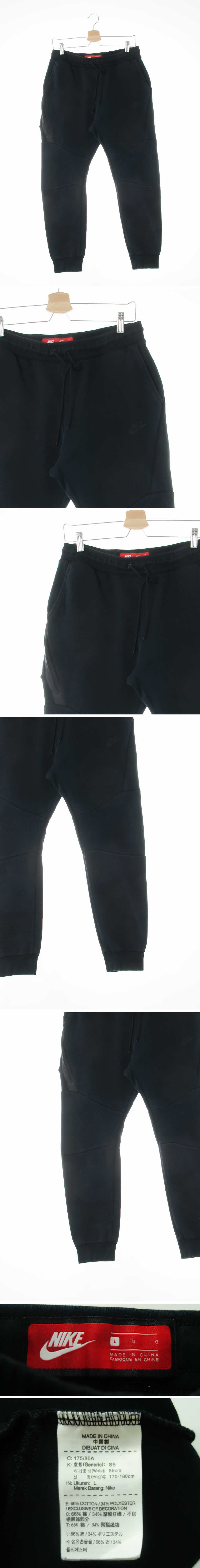 나이키 무릎절개빅지퍼조거팬츠 나이키 블랙 프린팅 면혼방 무릎절개빅지퍼조거팬츠