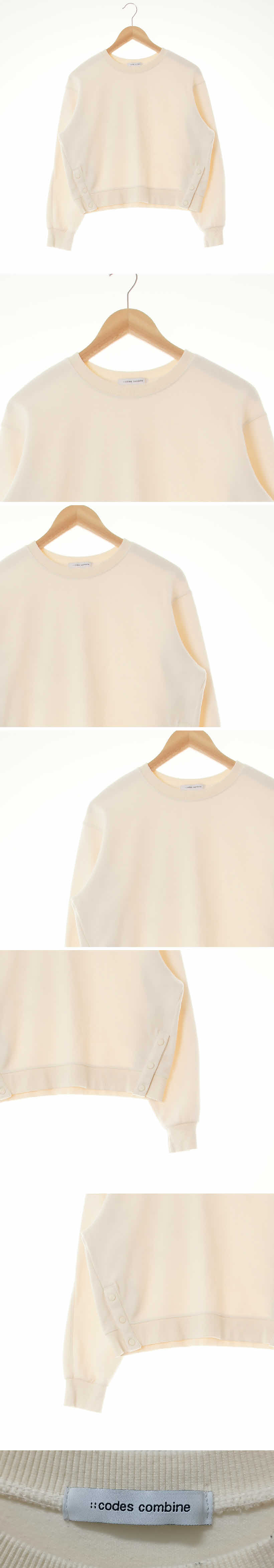 코데즈컴바인 아이보리 면 사이드버튼루즈맨투맨