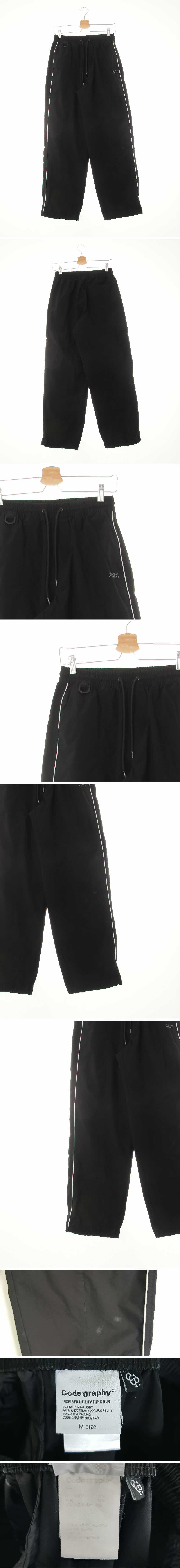 코드그라피 블랙 프린팅 사이드파이핑절개와이드팬츠
