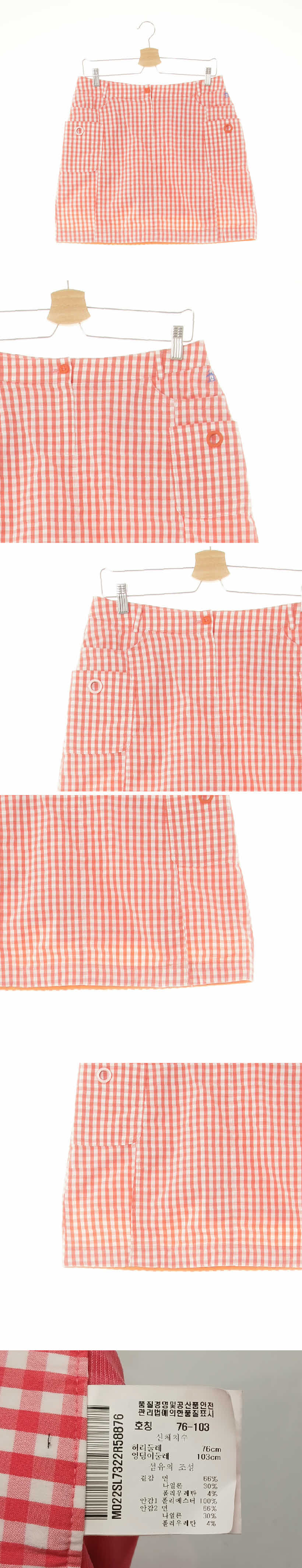 먼싱웨어 코랄 체크 면혼방 아웃포켓스트레치라운딩미니스커트