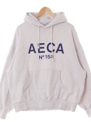 aeca 멜란지화이트 프린팅 면 컷오프드롭숄더후드티